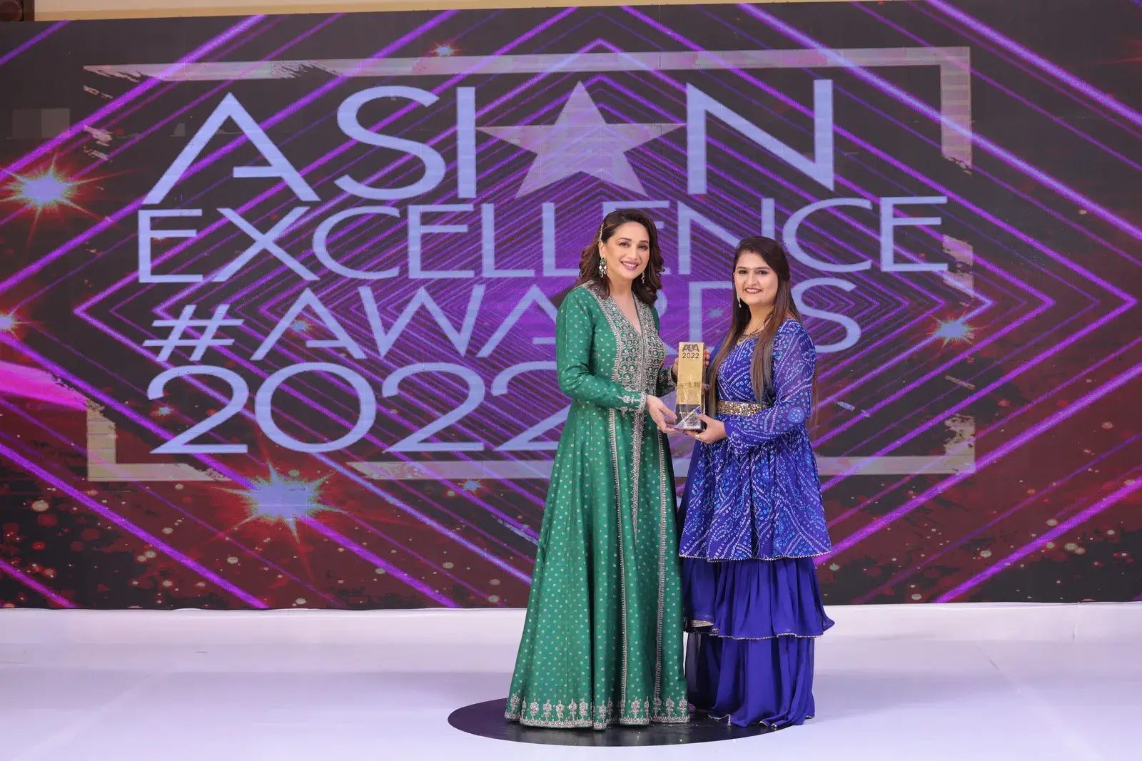 On stage at the Asian Excellence Awards 2022